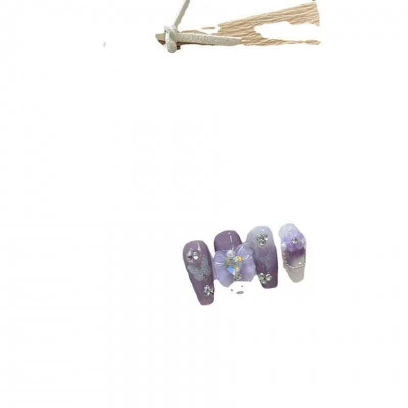 Handmade nail sticker sheet with purple iris tectorum butterfly design and nail glue tube in pack