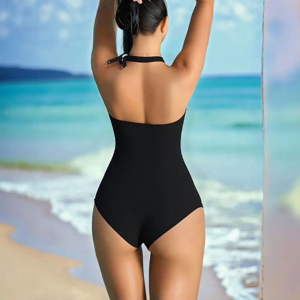 Black women's triangle pattern corset one-piece swimsuit with backless design and tight fit