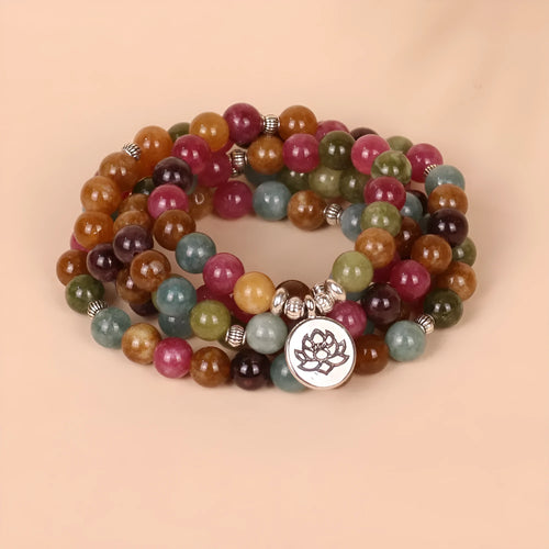 108 beads string lotus hanging multi-layer bracelet in tourmaline colour on alloy.