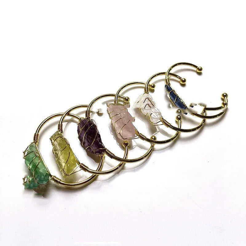 Handmade natural crystal rough stone bracelet with gold wire winding in geometric bohemian style