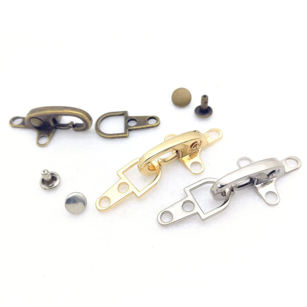 Alloy metal aircraft buckle decoration measuring 5.85cm in bronze, gold, gun colour, and silver finishes