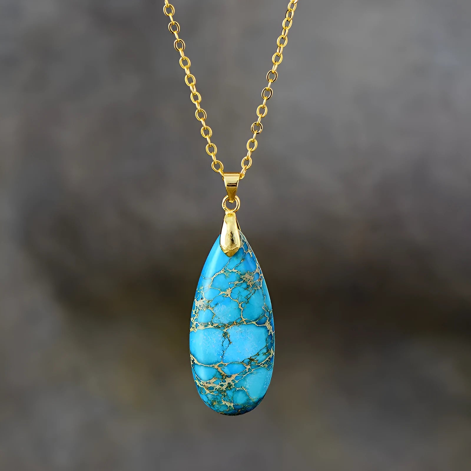 Jade water drop pendant on an 18K gold-plated chain, showing colour finish options.