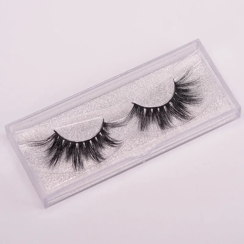 5D mink false eyelashes in natural black with double-headed brush and hair cap.