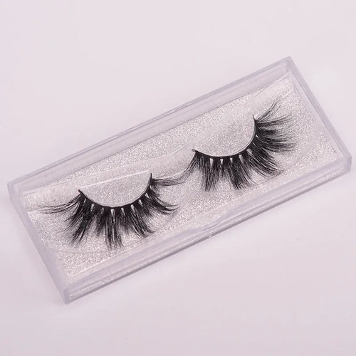 5D mink false eyelashes in natural black with double-headed brush and hair cap.