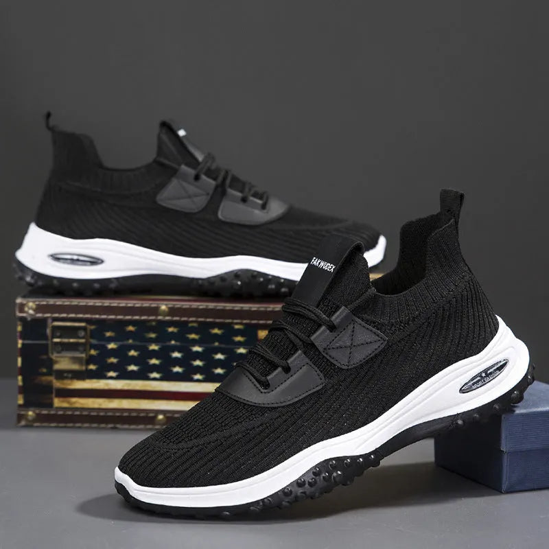 Black Flyknit low top running shoes with mesh lining and plastic sole