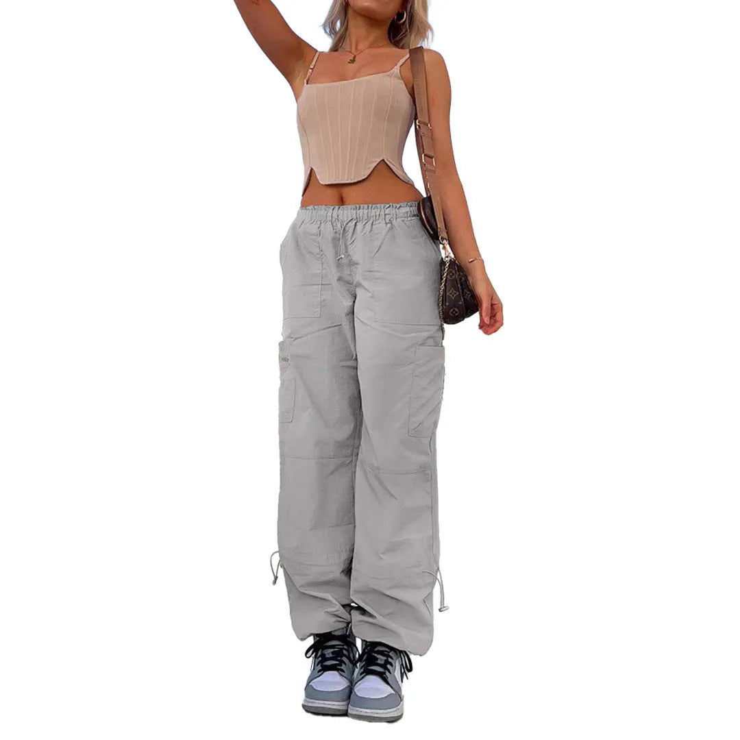 Multi-pocket straight-leg cargo casual pants in a light blue colour on a neutral background.