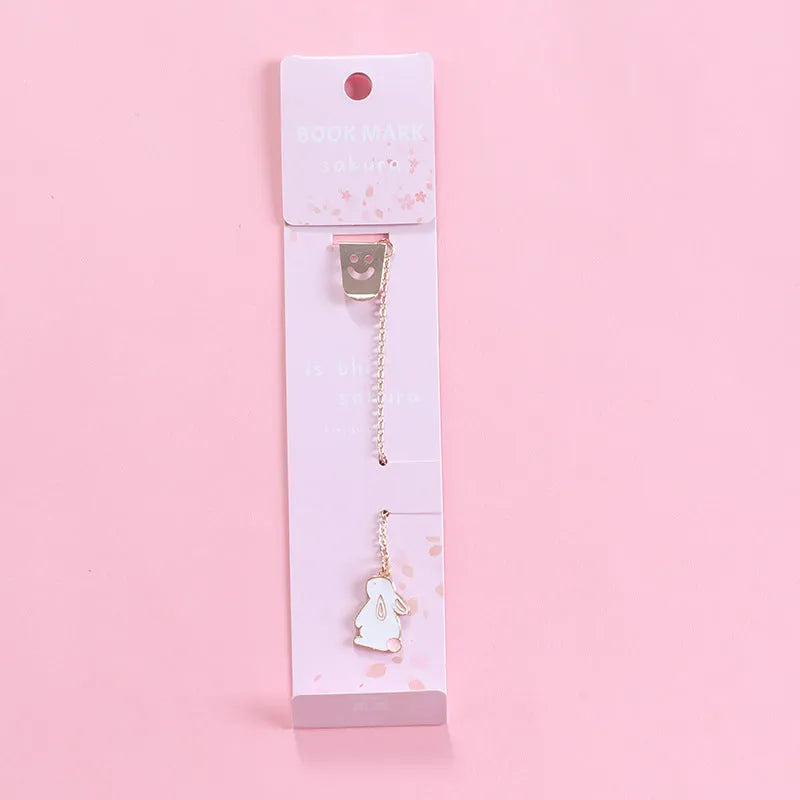 Metal bookmark with cartoon pendant in choice of animal and object designs