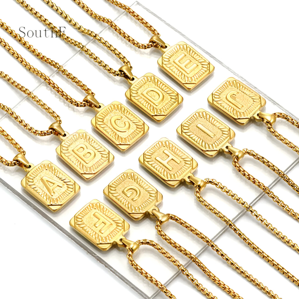 Gold-plated 18K titanium steel letter pendant necklace with pearl chain, unisex, letter M shown.
