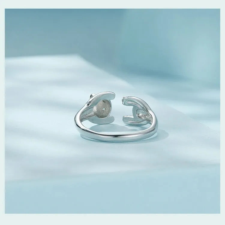Adjustable sterling silver panda ring with white gold plating and open design