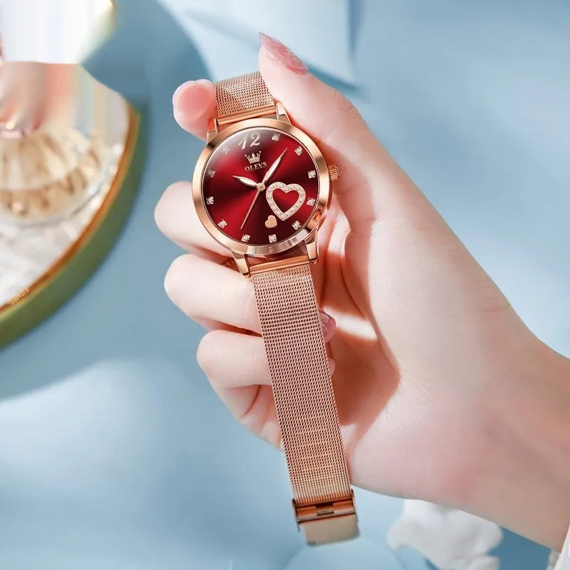 Women's fashion watch with rose shell alloy case and mesh strap, shown in multiple dial colour options.
