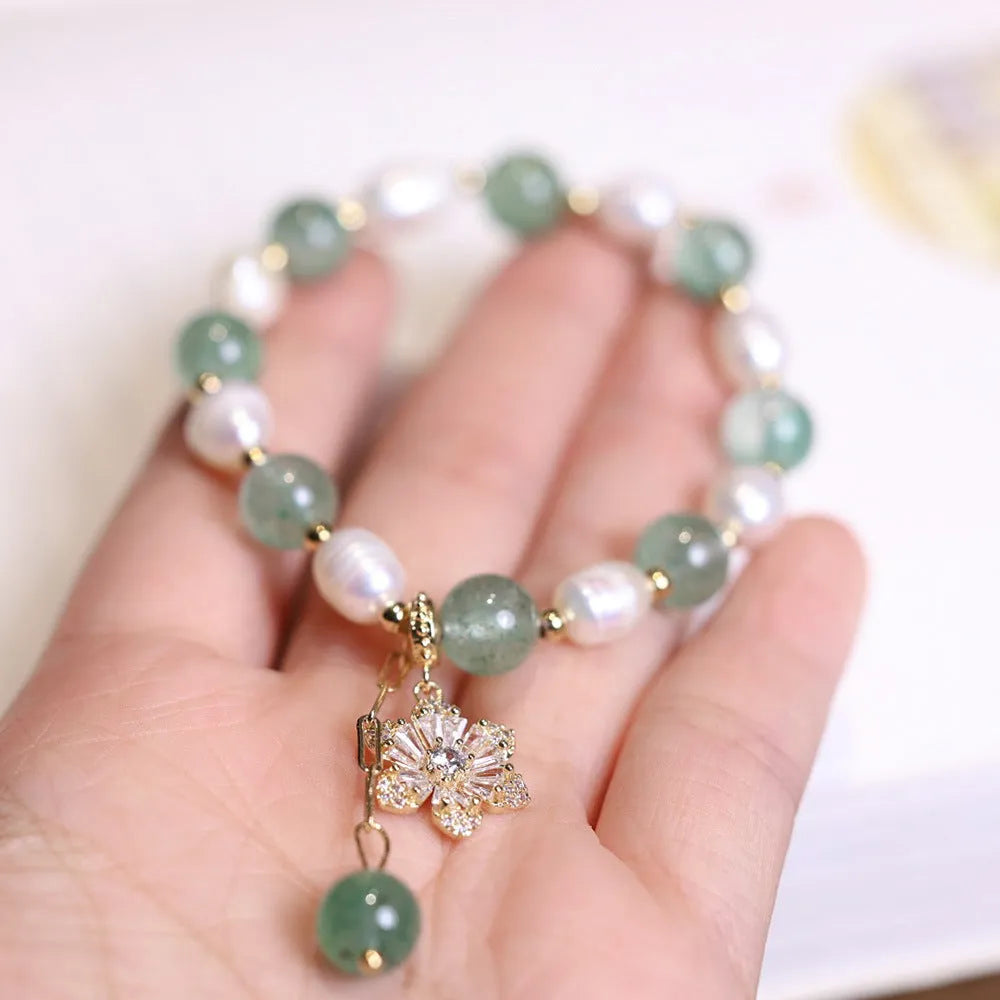 Green freshwater pearl bracelet with Chinese knot design and peace buckle closure