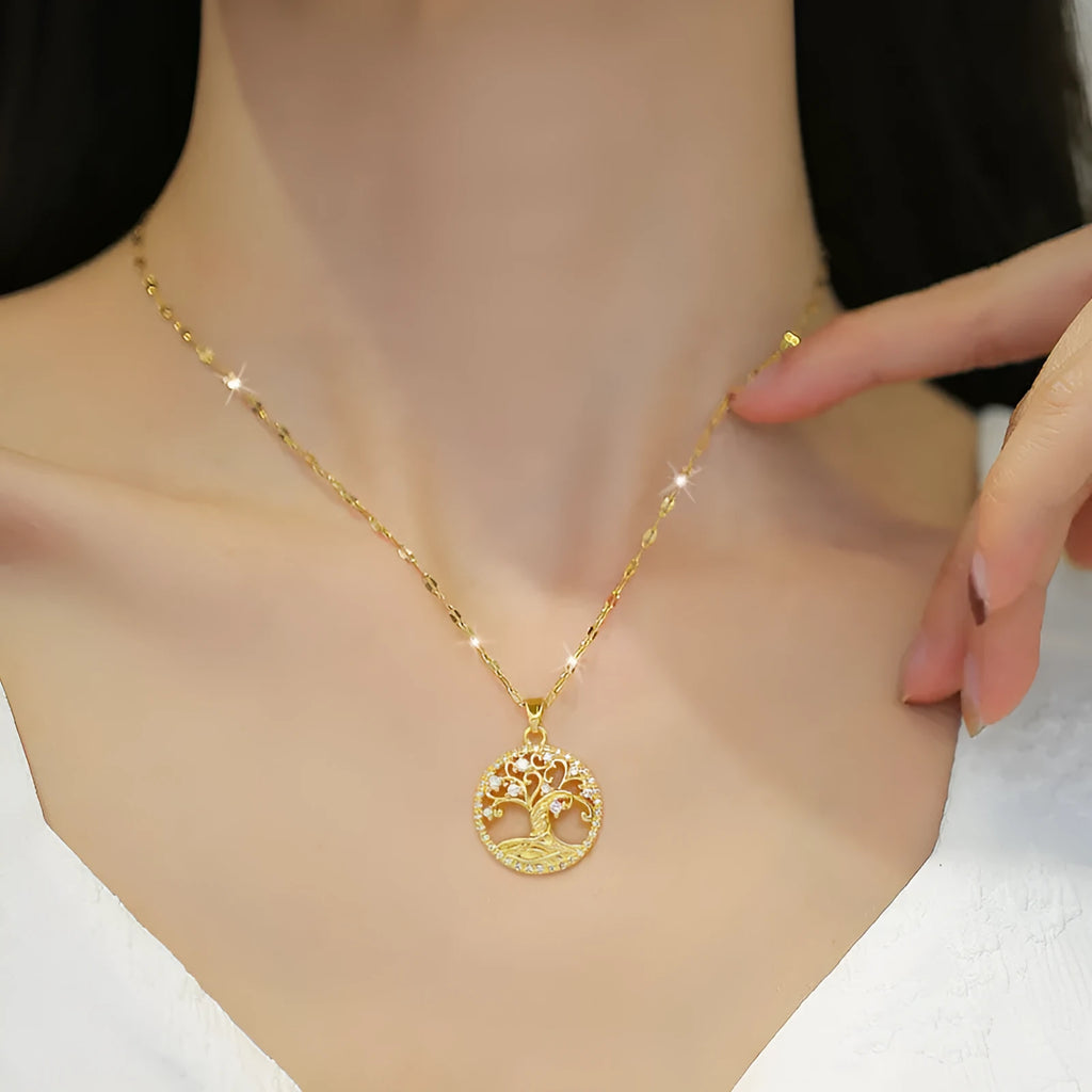 Gold-plated cross pendant necklace with micro-inlaid mother of pearl and rhinestone design on an adjustable chain.
