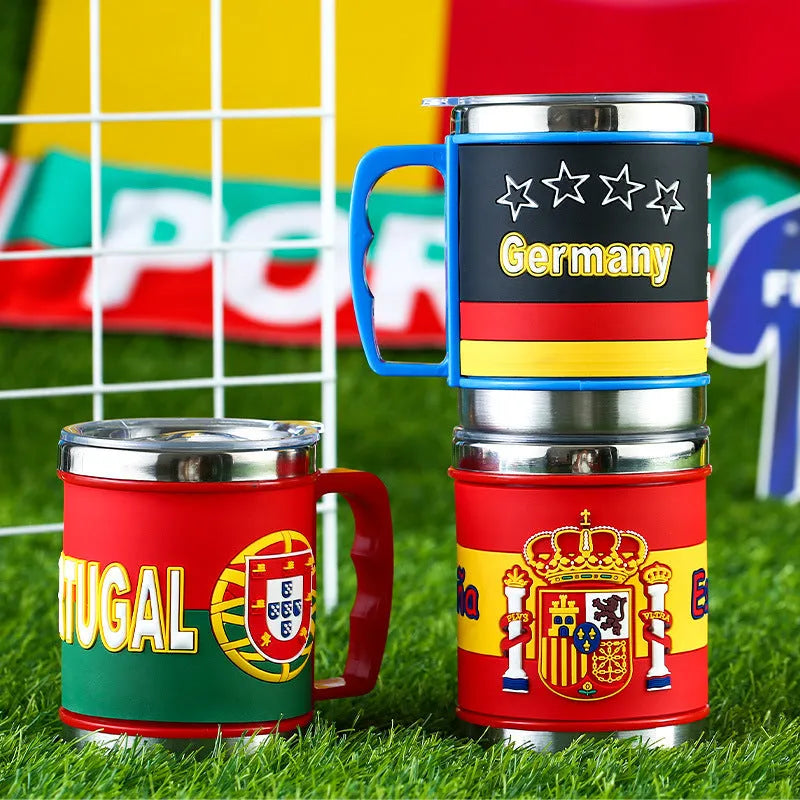 World Cup soccer mug souvenir in team colours, rubber and metal construction, 7.6cm diameter
