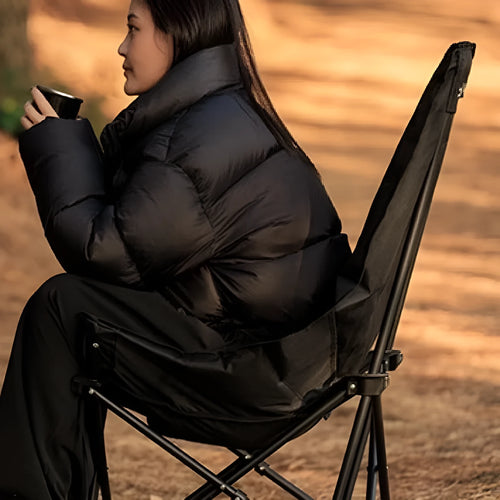 Black Oxford cloth folding moon chair with thickened seat cushion in folded position