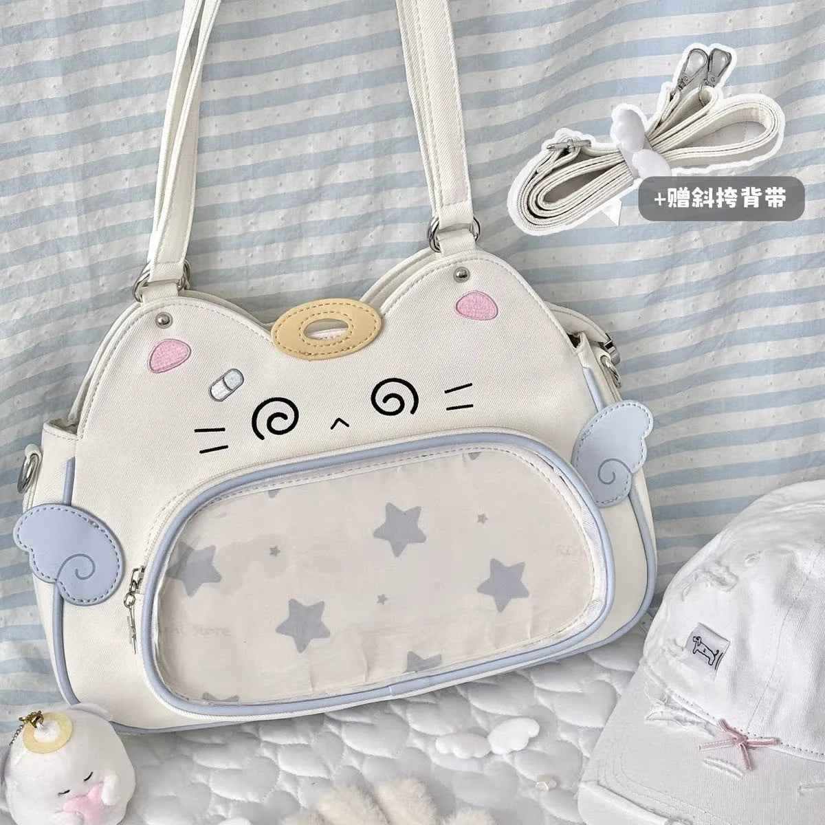 Horizontal cartoon owl pin PU crossbody bag in black, side view showing stitching and single strap