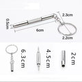 Stainless steel three-purpose screwdriver tool for glasses repair on a clean surface