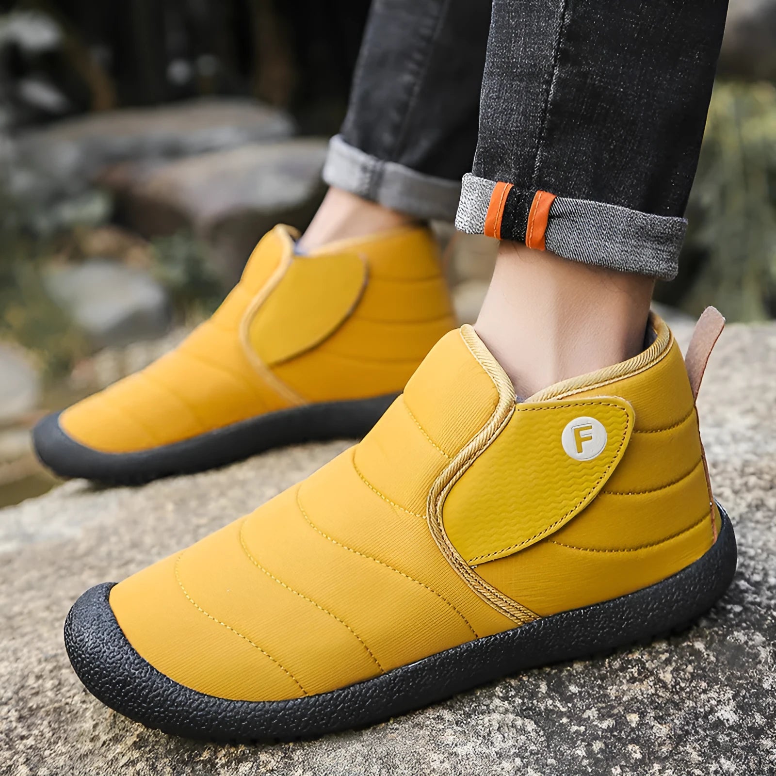 Men's waterproof snow boots in black with non-slip rubber soles and cotton upper