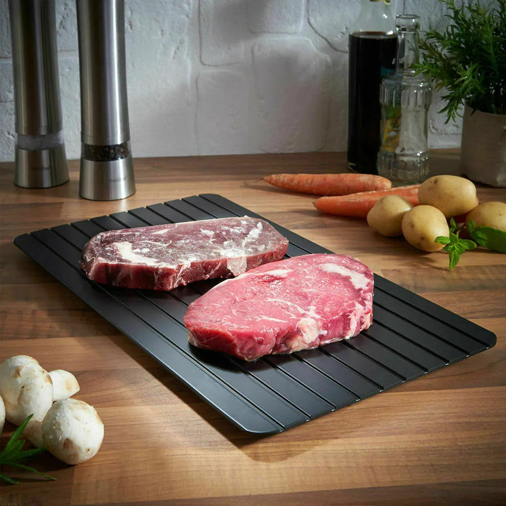 Black aluminium fast defrost tray for thawing frozen meat and food without electricity