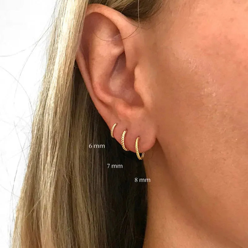 Twisted sterling silver round earrings in gold or white gold, available in 6mm, 7mm, 8mm, 13mm sizes