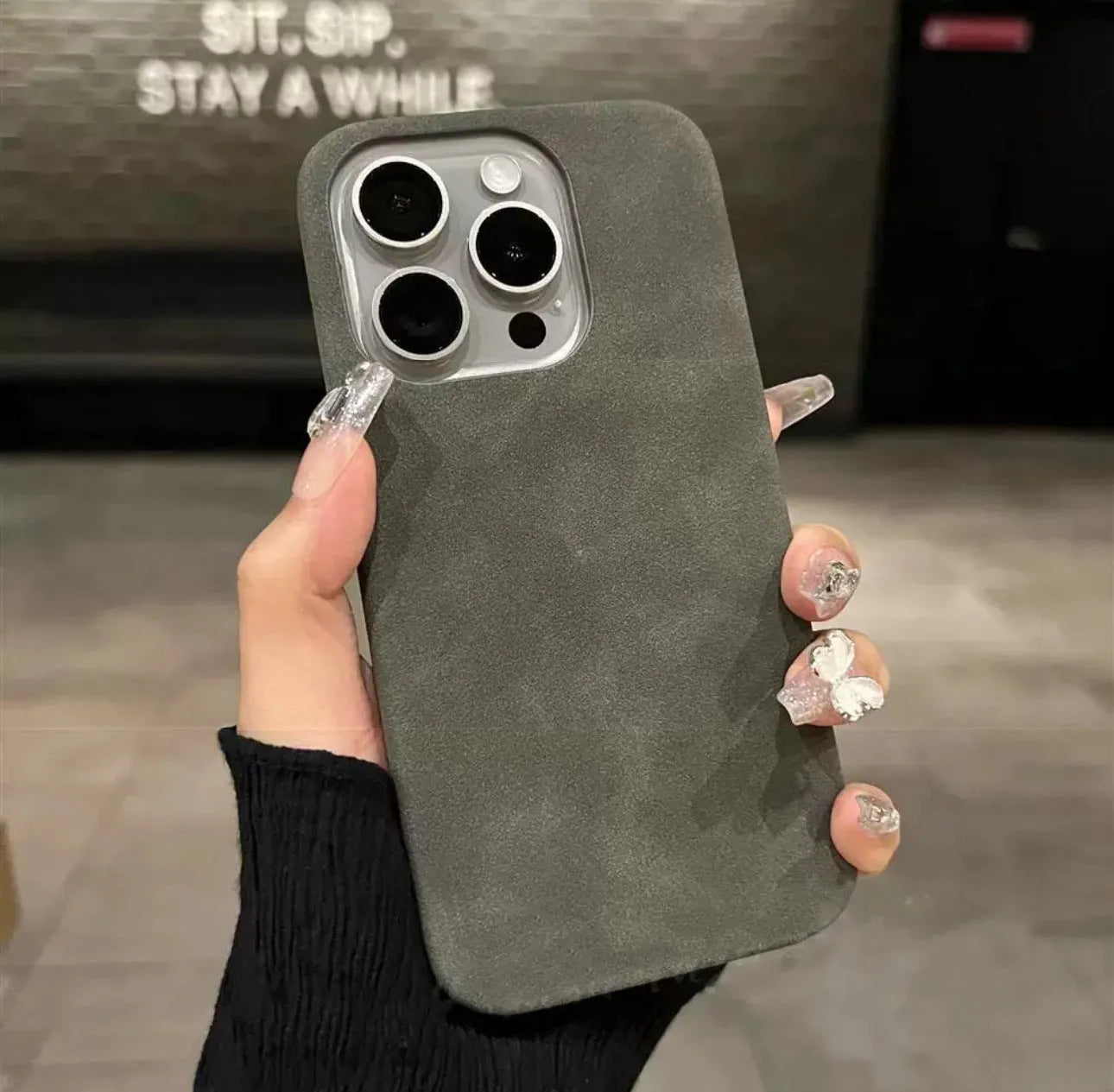 Solid colour suede imitation leather iPhone case in half-pack design showing shockproof protection features