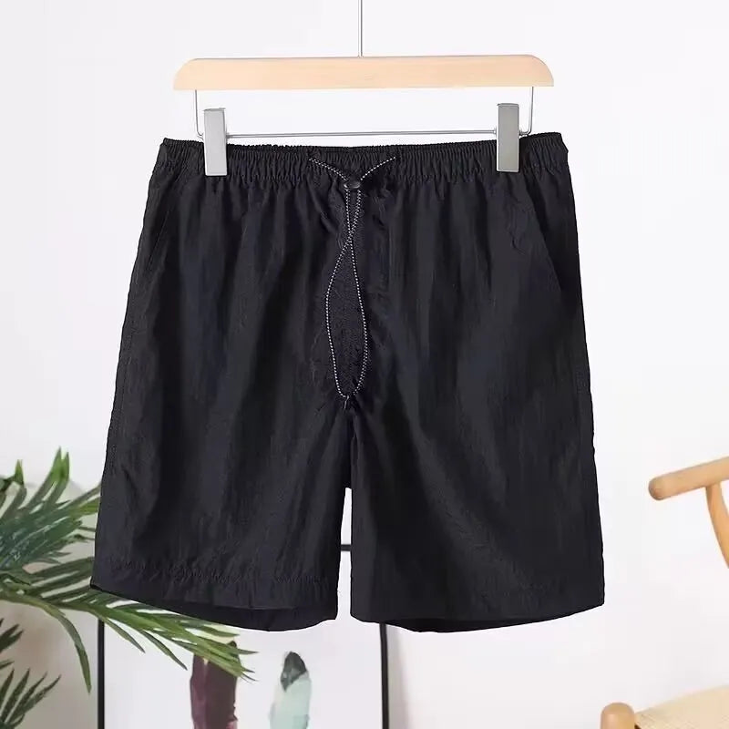 Men's straight cut polyester sports shorts in army green, black, blue, or gray colours