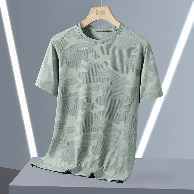 Men's camouflage pattern short sleeve t-shirt in plus sizes on a hanger.