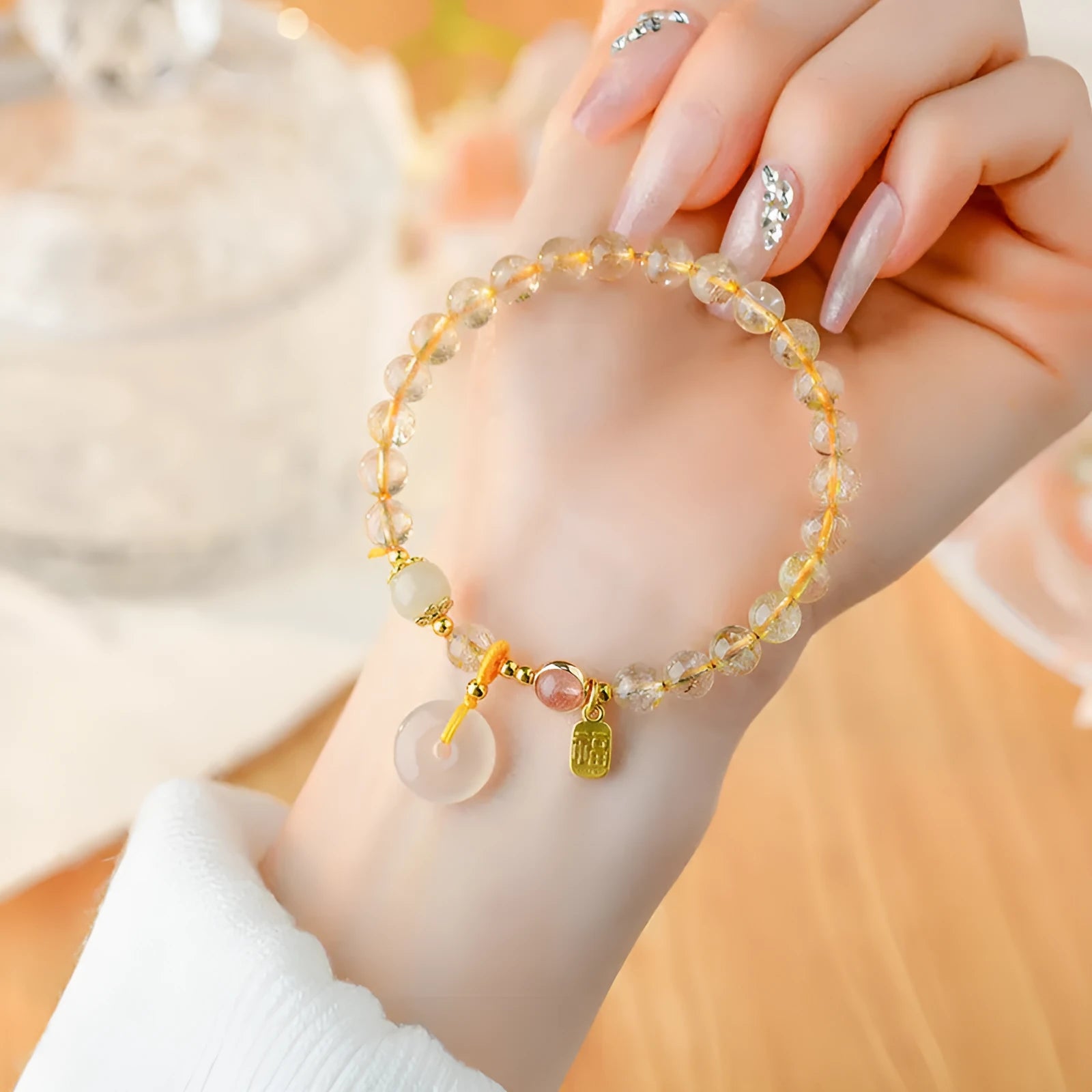 Gold rutilated quartz crystal bracelet with safety buckle and geometric pendant in national style design