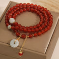 Red agate multi-layer bracelet with adjustable closure showing natural stone texture