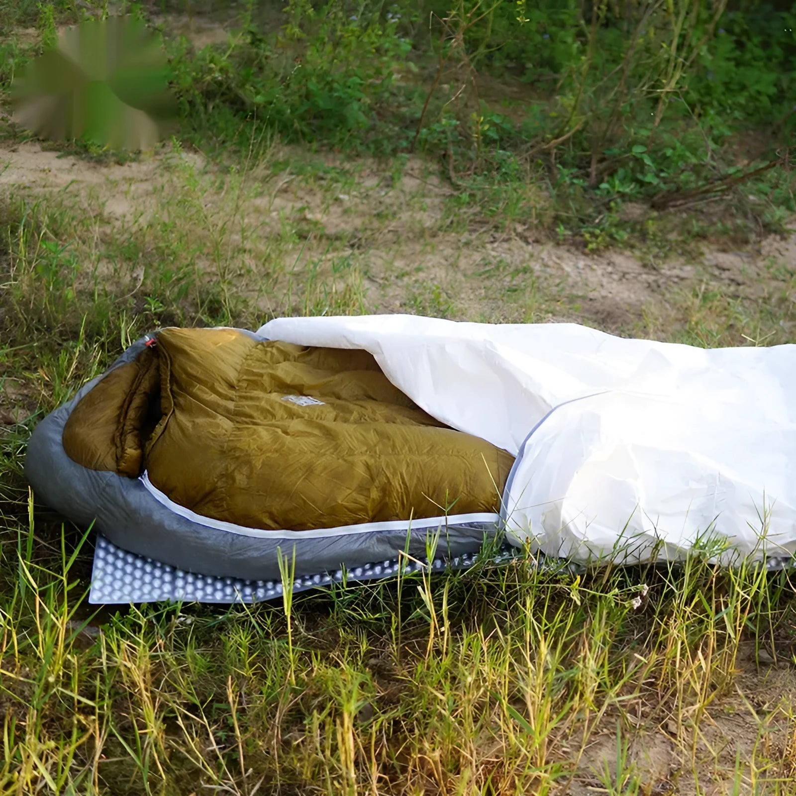 Outdoor climbing sleeping bag cover in mummy style for adult camping and travel.