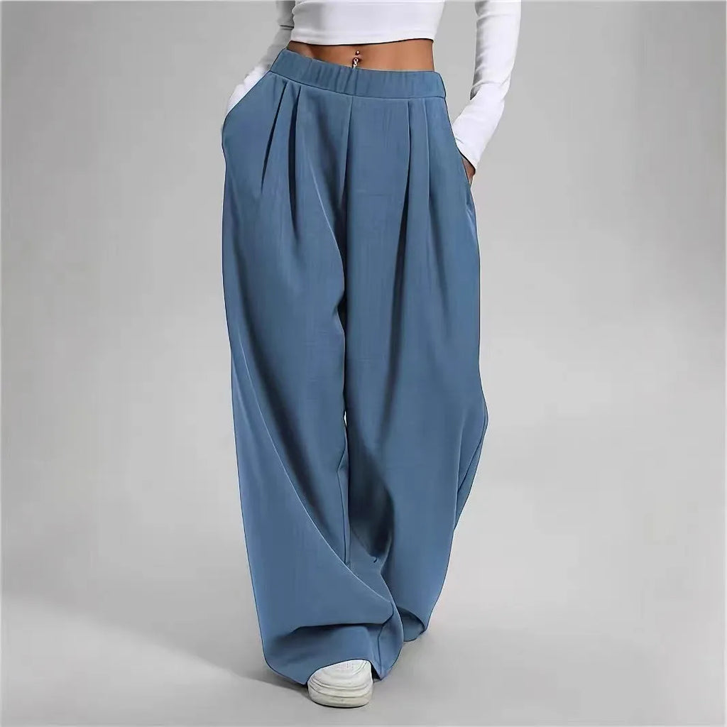 Women's high-waisted loose straight pants with pockets in black polyester fabric