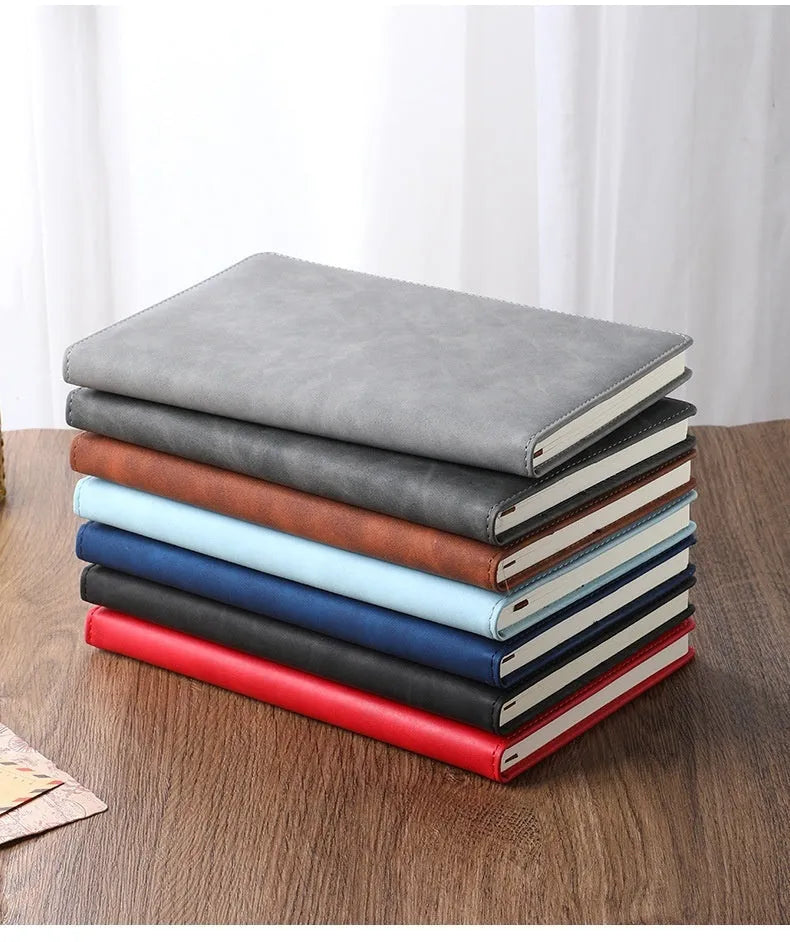 A5 notebook with PU leather cover in various colour options including black, red, green, blue, and orange
