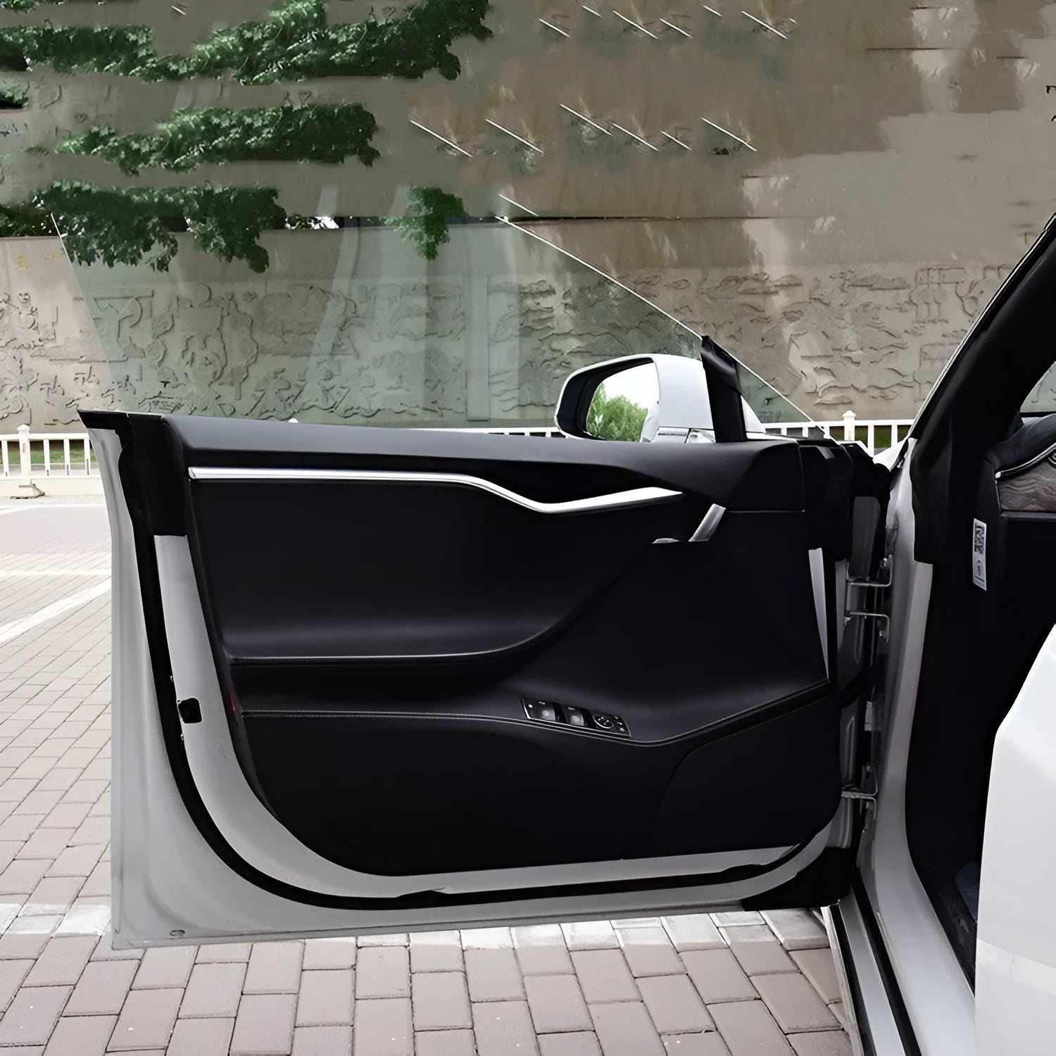 4-piece clear protective film kit for Tesla Model S interior car doors.