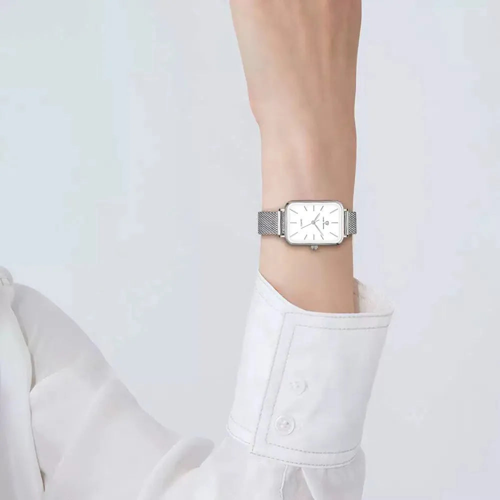 Women's waterproof quartz watch with 34mm alloy case and woven steel strap in rose gold or silver