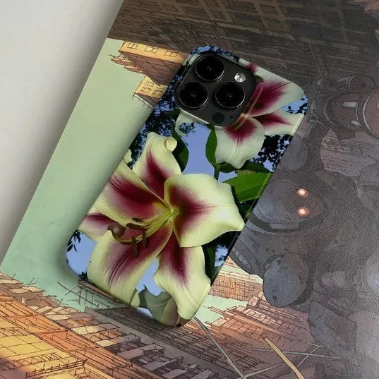 Dark Night Flower Trend Retro Art design on a hard shell iPhone case, showing glossy and frosted finish options.