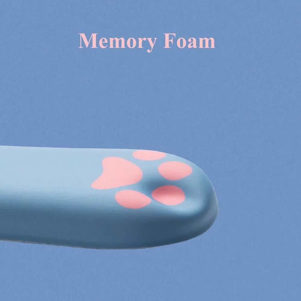 Cat's Claw cartoon design memory foam keyboard wrist rest pad in blue, shown on a desk.