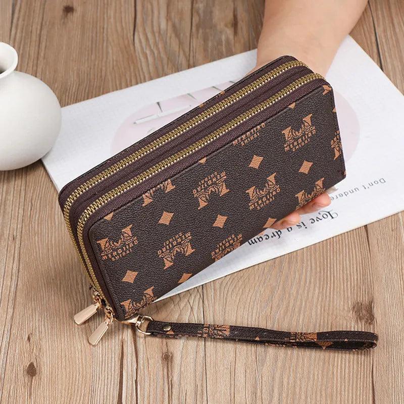 Long black PU leather wallet clutch with retro styling, open to show mobile phone compartment and coin purse sections