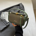 Women's black PU leather crossbody messenger bag with contrast stitching and lock detail