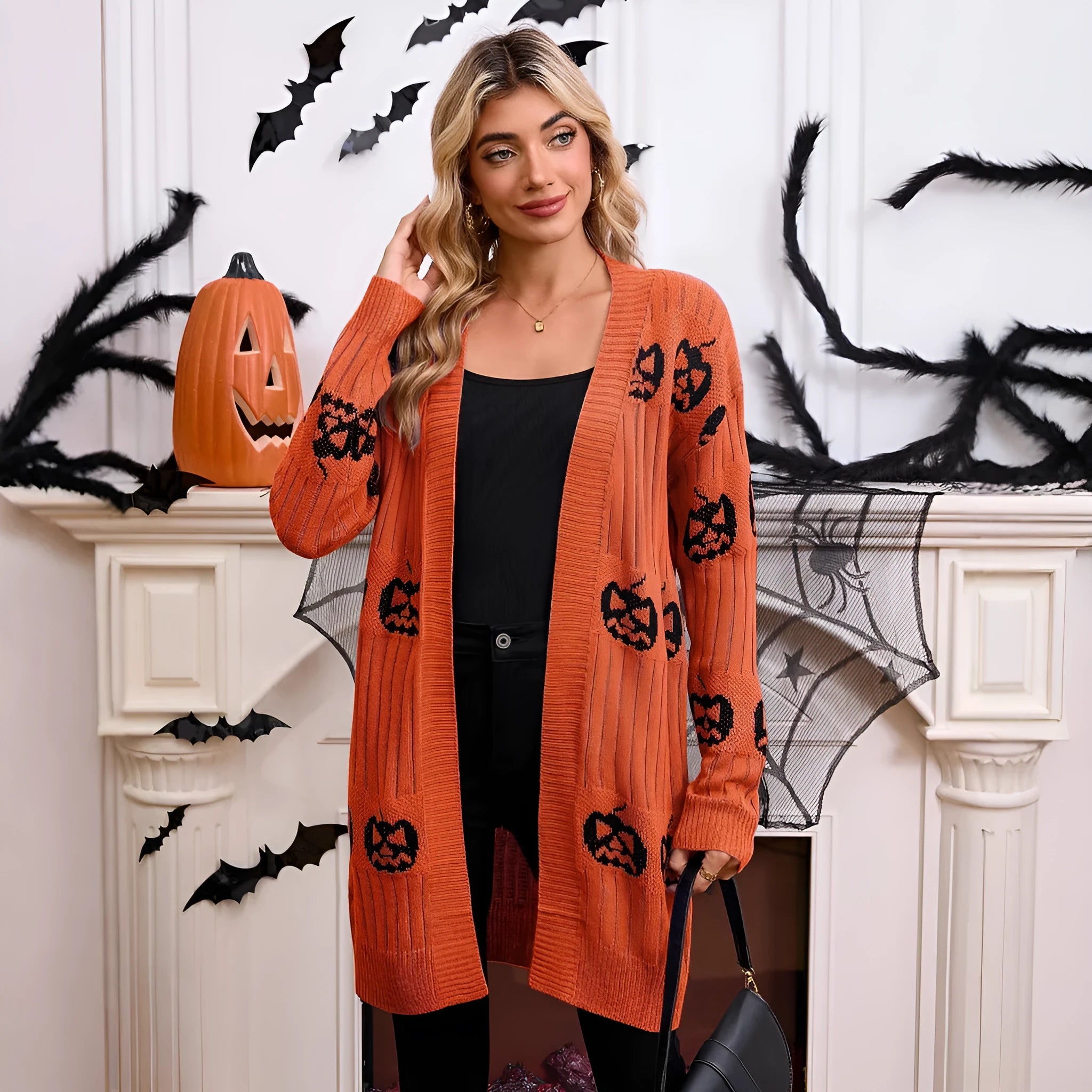 Women's black Halloween cardigan with orange pumpkin head jacquard pattern knitted design