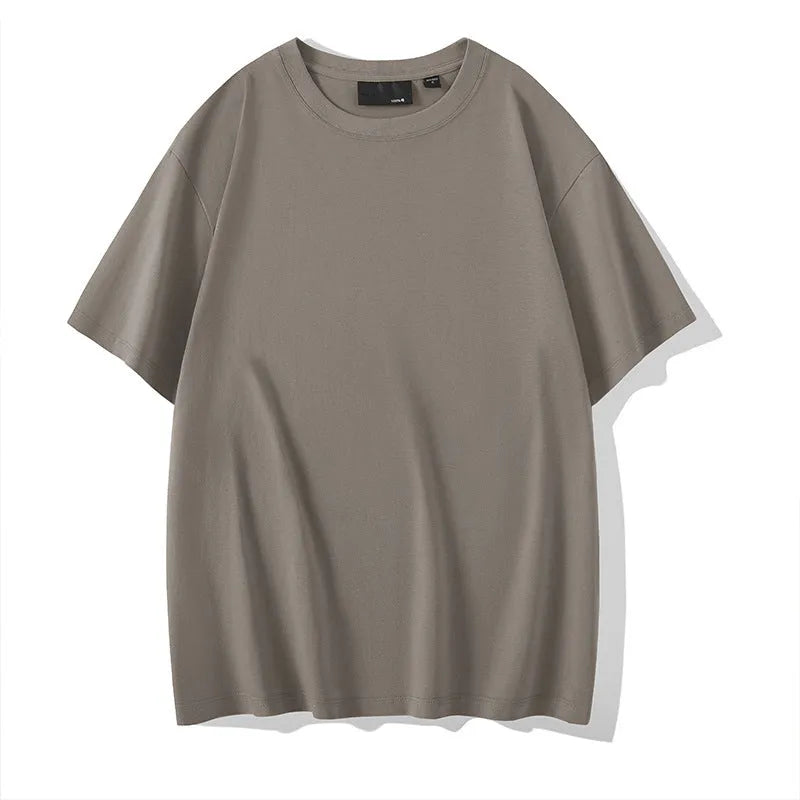 Loose fit men's cotton t-shirt with round neck and drop-shoulder sleeves in solid colour