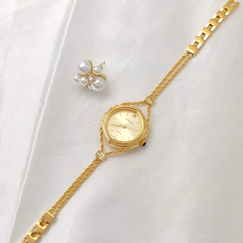 Gold and silver mori style ladies quartz watch with 25mm dial and chain strap