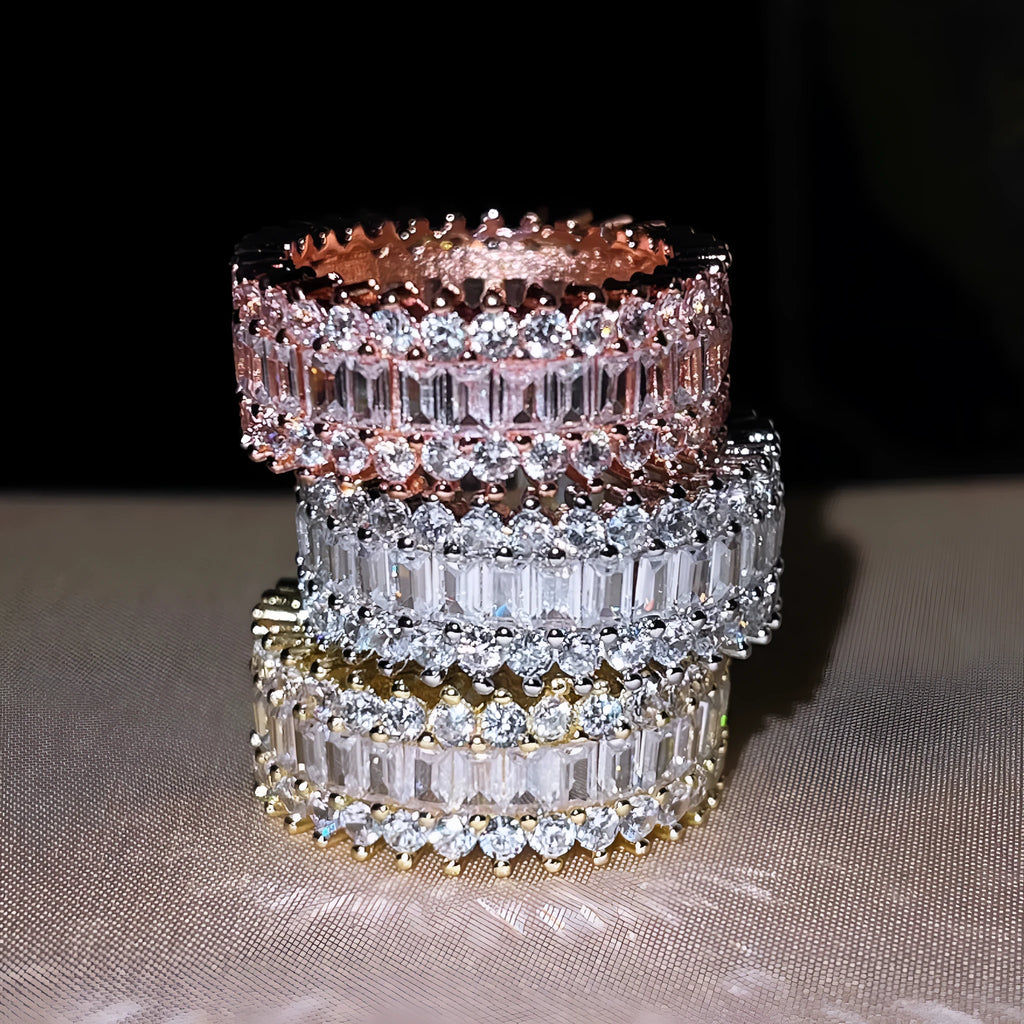 Geometric copper ring with zircon inlay in rose gold finish on neutral background