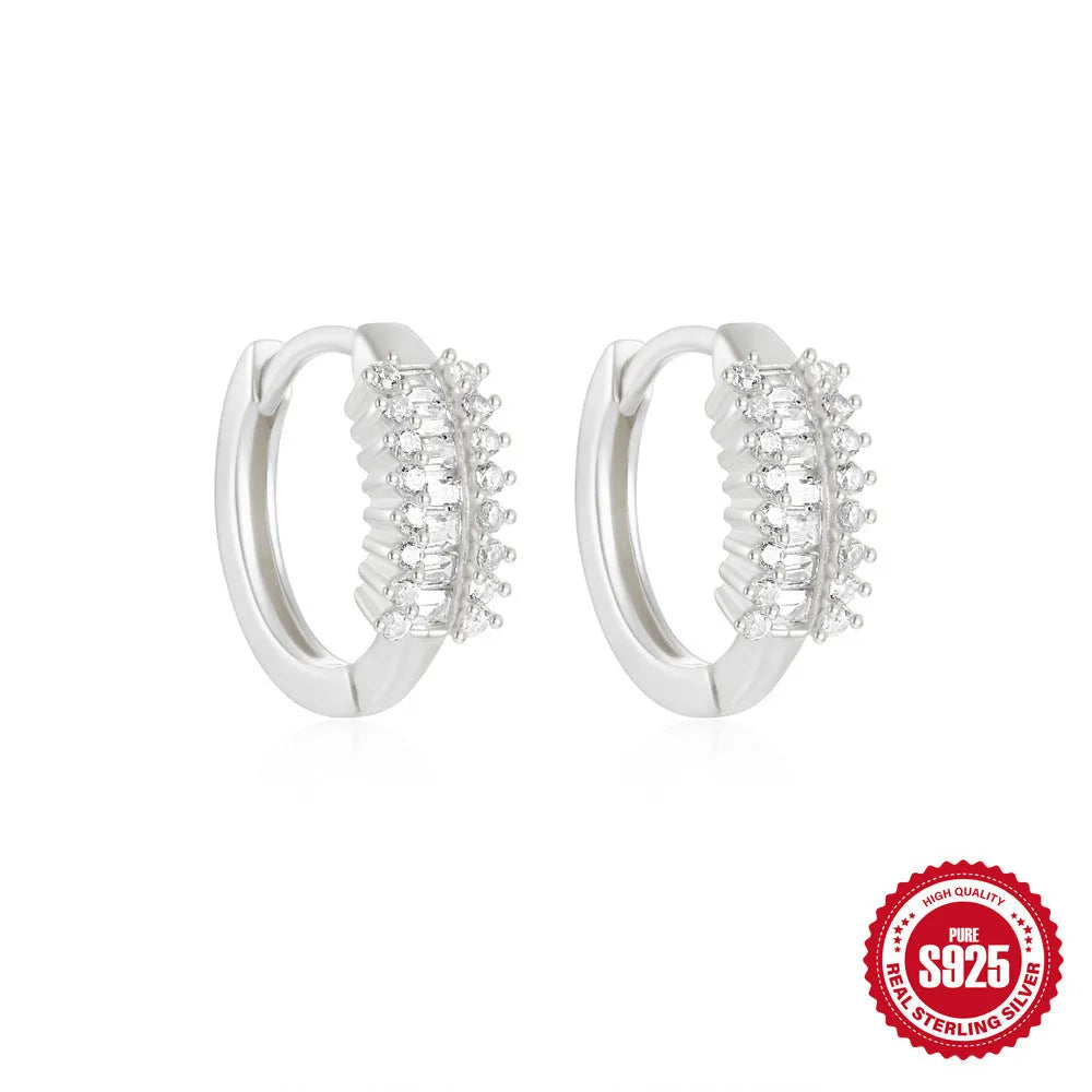Small round geometric sterling silver stud earrings with diamond accents in gold or silver finish