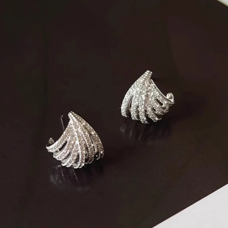 Women's geometric earrings in platinum colour with zircon construction and electroplated finish