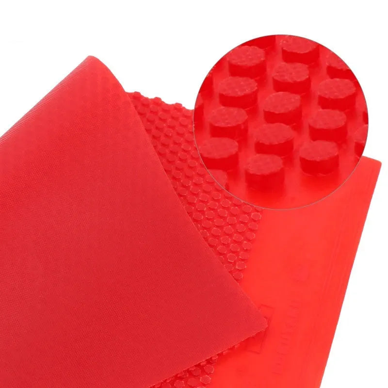 Single-sided table tennis rubber sheet with small pimple texture in black and red colours