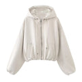 Women's casual suede hooded jacket in black with a zip front closure