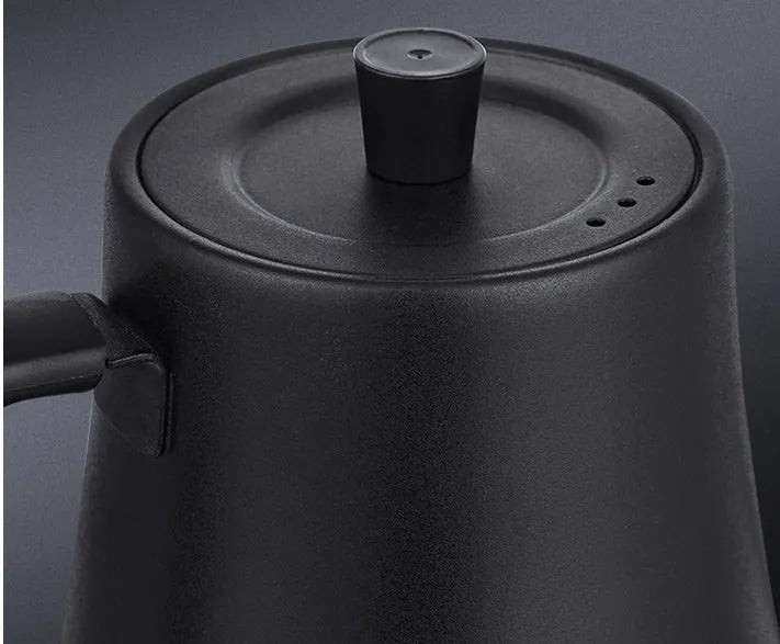 Black stainless steel slender mouth touch control electric kettle with inner scale marking on a desk