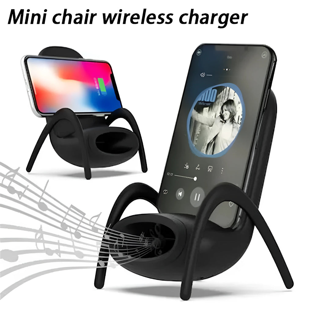 White chair-shaped wireless charging phone stand charging a smartphone on a desk
