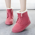Women's lace up platform snow boots in suede with faux fur lining, flat heel, round toe, available in multiple colours