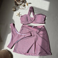 One-shoulder tube top glossy cloth three piece swimsuit in solid polyester, includes top, pants, and skirt