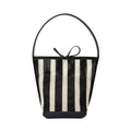 Black and white striped woven shoulder bag with bucket shape showing dimensions